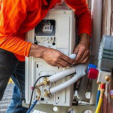 Tankless-Water-Heater-Repair-Installation-in-Houma-Endless-Hot-Water-Energy-Savings-and-Space-Efficiency-with-MK-Electric-Man 0